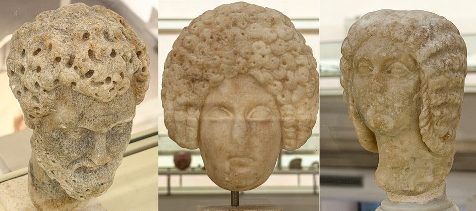 Antike römische Porträtköpfe aus Marmor mit männlichen und weiblichen Frisuren der Kaiserzeit im Museo Nazionale Romano in den Diokletiansthermen