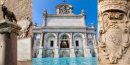 Capitoline Wolf, Latin inscriptions on the Acqua Paola fountain, and an SPQR relief in Rome